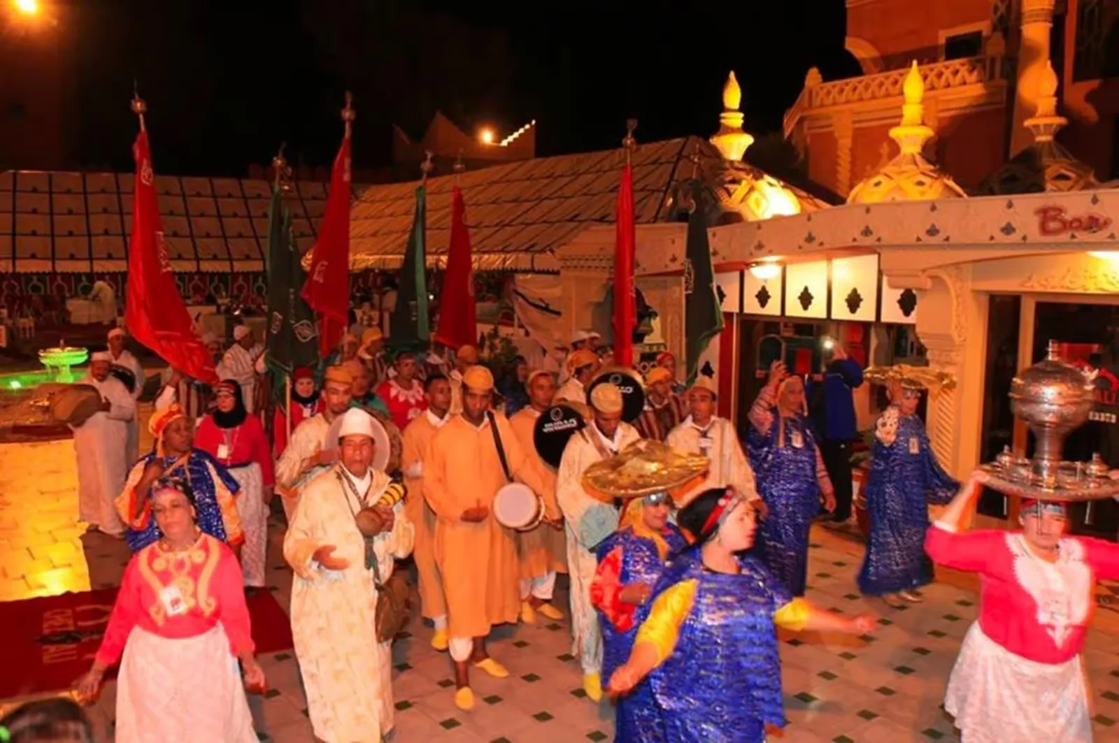 Moroccan Fantasia horsemen performing a charge at the show